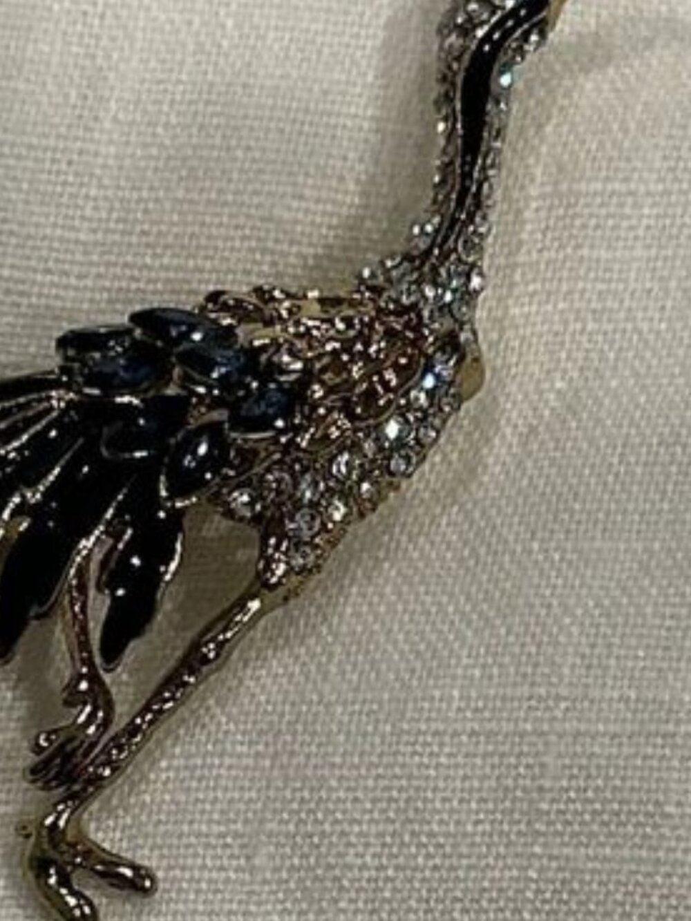 Elegant Gold and Black Bird Brooch